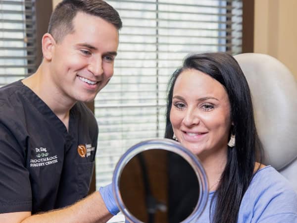 Female patient does cosmetic consultation with Dr. Brian King at Surgical Dermatology Group